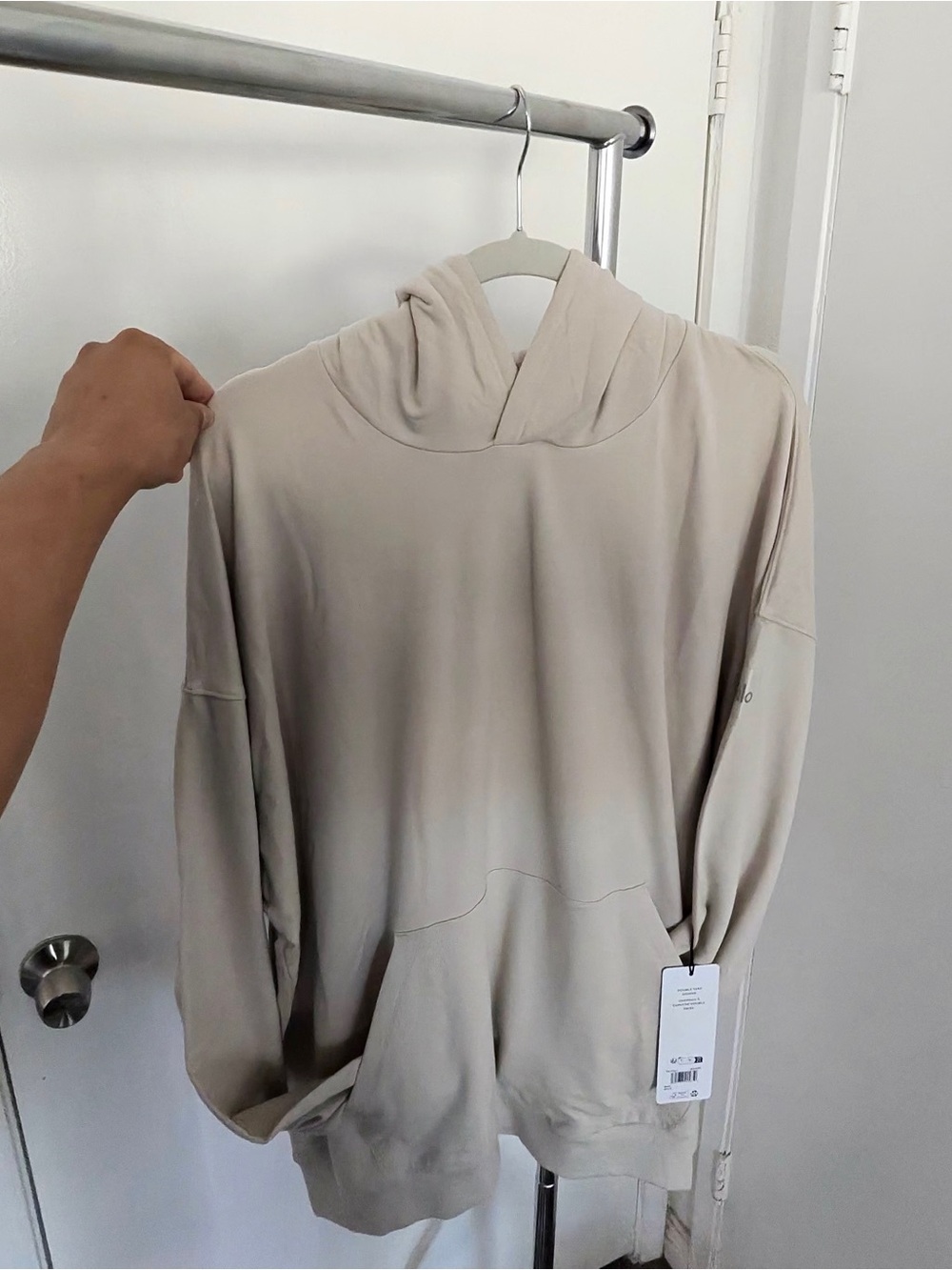 Alo double take hoodie bone color.